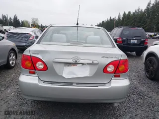 2004 Toyota Corolla CE with VIN 1NXBR32E74Z336134, listed as a IAAI auction lot 41966813 with 257,177 mi miles. Bid and sale history available at carsss.com. Image 16.