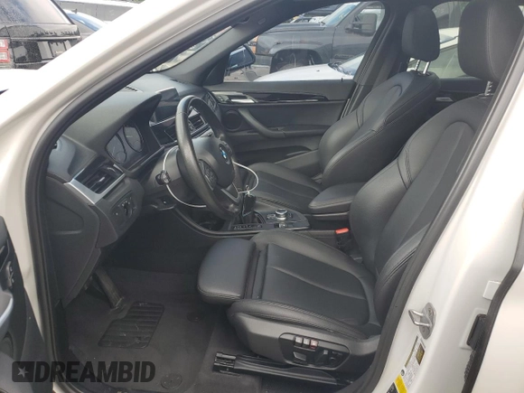 2019 BMW X1 xDrive28i with VIN WBXHT3C52K3H34021, listed as a Copart auction lot 64032535 with 30,752 mi miles and Salvage title. Bid and sale history available at DreamBid. Image 7.