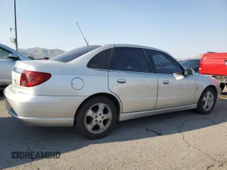 2003 Saturn LS z VIN 1G8JU54F13Y552725, wystawiony jako Copart lot #50244805 z przebiegiem 131 259 mil mil oraz Szkoda całkowita • Salvage title. Historia ofert i sprzedaży dostępna na DreamBid. Obrazek 3.