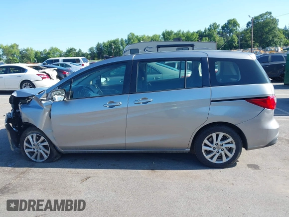 2012 Mazda 5 Sport with VIN JM1CW2BLXC0129303, listed as a IAAI auction lot 42556899 with 200,863 mi miles and . Bid and sale history available at DreamBid. Image 15.