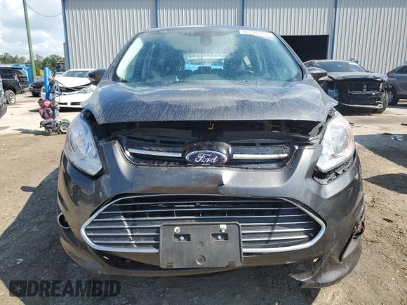 2016 Ford C-Max Energi SEL with VIN 1FADP5CU0GL101658, listed as a Copart auction lot 68214393 with 66,390 mi miles. Bid and sale history available at carsss.com. Image 5.