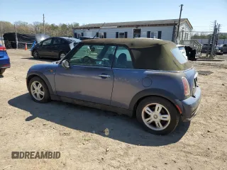 2006 MINI Convertible with VIN WMWRF33556TG14421, listed as a Copart auction lot 50090415 with 136,736 mi miles and Non repairable. Bid and sale history available at DreamBid. Image 2.