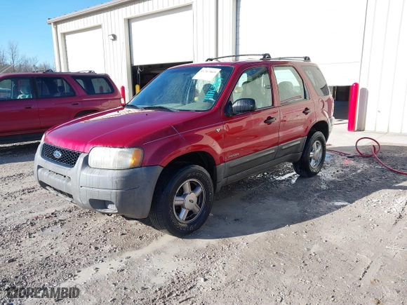 2001 Ford Escape XLS with VIN 1FMYU01171KD93513, listed as a IAAI auction lot 41767869 with 148,940 mi miles. Bid and sale history available at carsss.com. Image 2.