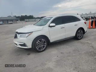 2018 Acura MDX Advance z VIN 5J8YD3H93JL000409, wystawiony jako Copart lot #57666135 z przebiegiem Nie podano mil oraz Szkoda całkowita • Salvage title. Historia ofert i sprzedaży dostępna na DreamBid. Obrazek 1.