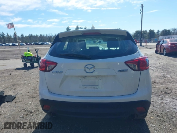 2016 Mazda CX-5 Sport with VIN JM3KE2BY9G0887110, listed as a IAAI auction lot 41761039 with 86,624 mi miles. Bid and sale history available at carsss.com. Image 17.