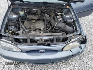 1999 Ford Escort LX with VIN 1FAFP10P6XW211371, listed as a Copart auction lot 82523444 with 122,534 mi miles and Salvage Title. Bid and sale history available at carsss.com. Image 11.