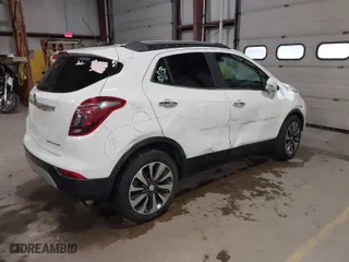 2019 Buick Encore Essence with VIN KL4CJCSM0KB888312, listed as a IAAI auction lot 41521541 with 135,219 mi miles. Bid and sale history available at carsss.com. Image 4.