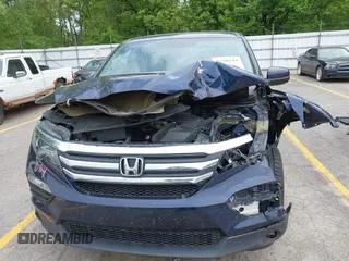 2018 Honda Pilot EX-L with VIN 5FNYF6H57JB046433, listed as a IAAI auction lot 42296714 with Not provided miles and . Bid and sale history available at DreamBid. Image 11.