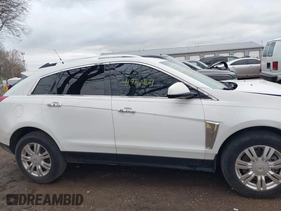 2013 Cadillac SRX Luxury Collection with VIN 3GYFNCE32DS527577, listed as a IAAI auction lot 41916467 with 137,462 mi miles and . Bid and sale history available at DreamBid. Image 14.