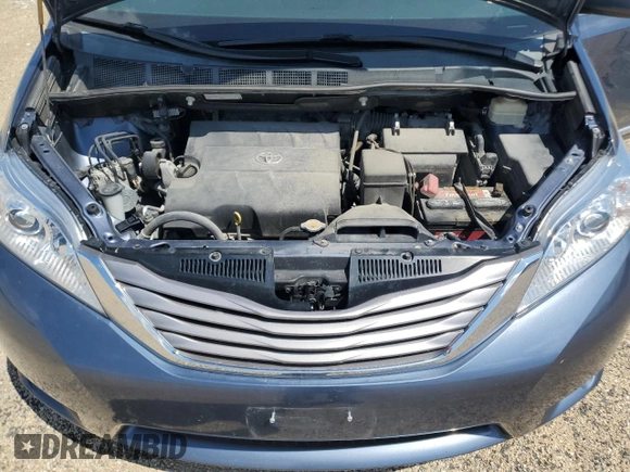 2015 Toyota Sienna XLE with VIN 5TDYK3DC4FS619385, listed as a Copart auction lot 57090385 with 112,896 mi miles and Salvage title. Bid and sale history available at DreamBid. Image 12.