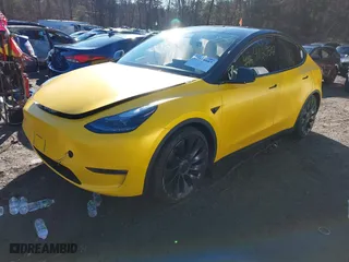 2022 Tesla Model Y Performance with VIN 7SAYGDEF2NF310276, listed as a IAAI auction lot 41129507 with 34,290 mi miles. Bid and sale history available at carsss.com. Image 18.