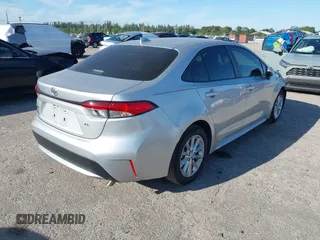 2022 Toyota Corolla LE with VIN JTDVPMAE7N3016592, listed as a IAAI auction lot 41856939 with 28,597 mi miles. Bid and sale history available at carsss.com. Image 4.