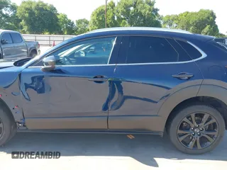 2021 Mazda CX-30 Premium with VIN 3MVDMBDYXMM307047, listed as a IAAI auction lot 41974966 with 53,409 mi miles and . Bid and sale history available at carsss.com. Image 15.