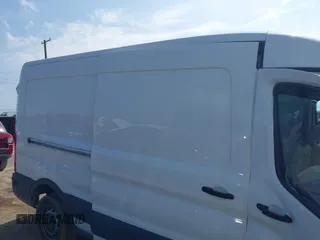 2016 Ford Transit Cargo z VIN 1FTYR2CM6GKA55411, wystawiony jako IAAI lot #42582896 z przebiegiem 89 921 mil mil oraz . Historia ofert i sprzedaży dostępna na DreamBid. Obrazek 8.
