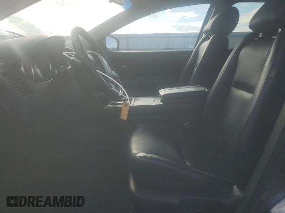 2015 Mazda CX-9 Touring z VIN JM3TB3CA2F0460970, wystawiony jako Copart lot #61544015 z przebiegiem 102 190 mil mil oraz Czysty tytuł • Clean title. Historia ofert i sprzedaży dostępna na DreamBid. Obrazek 7.