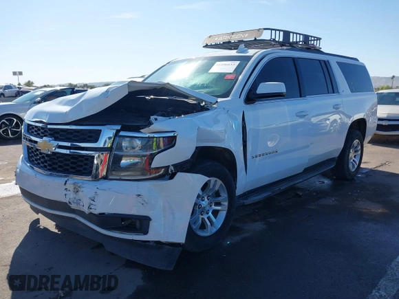 2019 Chevrolet Suburban LT with VIN 1GNSCHKC3KR143942, listed as a IAAI auction lot 41896633 with 153,139 mi miles and . Bid and sale history available at DreamBid. Image 17.