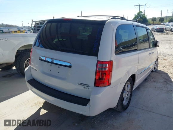 2010 Dodge Grand Caravan SXT with VIN 2D4RN5D1XAR462150, listed as a IAAI auction lot 41466381 with 204,531 mi miles and . Bid and sale history available at DreamBid. Image 4.