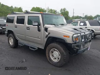 2004 Hummer H2 z VIN 5GRGN23U94H106012, wystawiony jako IAAI lot #42447680 z przebiegiem 67 800 mil mil oraz . Historia ofert i sprzedaży dostępna na DreamBid. Obrazek 1.