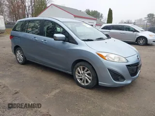 2012 Mazda 5 Sport with VIN JM1CW2BL0C0141119, listed as a IAAI auction lot 42073200 with 142,805 mi miles. Bid and sale history available at carsss.com. Image 1.
