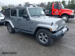 2016 Jeep Wrangler Unlimited 75th Anniversary with VIN 1C4BJWEG7GL162716, listed as a IAAI auction lot 41979882 with 77,034 mi miles. Bid and sale history available at carsss.com. Image 1.