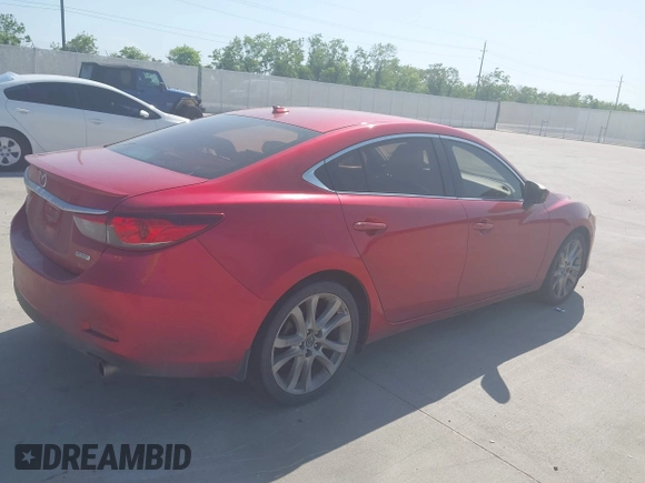 2014 Mazda 6 i Grand Touring with VIN JM1GJ1W65E1141953, listed as a IAAI auction lot 42027145 with 187,514 mi miles and . Bid and sale history available at DreamBid. Image 4.