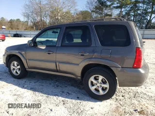 2006 Mazda Tribute S with VIN 4F2YZ04176KM19634, listed as a Copart auction lot 46796315 with 276,632 mi miles and Salvage Title. Bid and sale history available at DreamBid. Image 2.