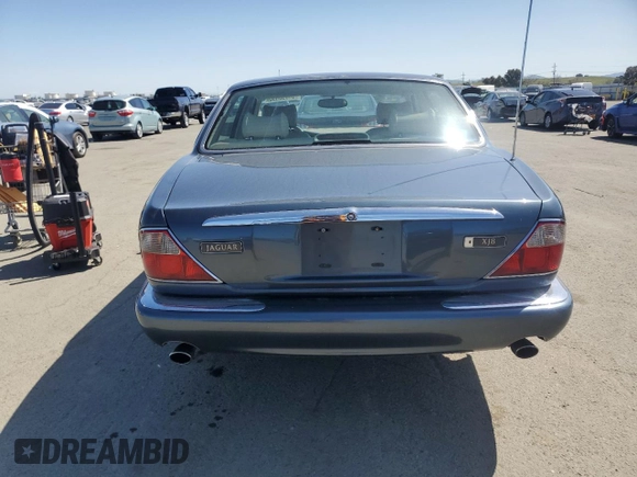 1998 Jaguar XJ with VIN SAJHX1247WC841374, listed as a Copart auction lot 51693595 with 109,509 mi miles and Clean Title. Bid and sale history available at DreamBid. Image 6.