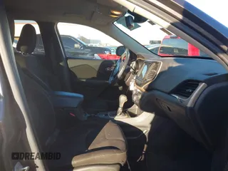 2016 Jeep Cherokee Altitude with VIN 1C4PJLCS8GW173279, listed as a IAAI auction lot 41129117 with 163,978 mi miles. Bid and sale history available at carsss.com. Image 5.