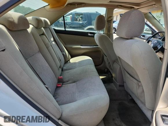2005 Toyota Camry STD с VIN 4T1BE32K75U626098, выставлен на аукционе Copart как лот 55910145 с пробегом 227 015 миль миль и Списание • Salvage title. История ставок и продаж доступна на DreamBid. Изображение 10.