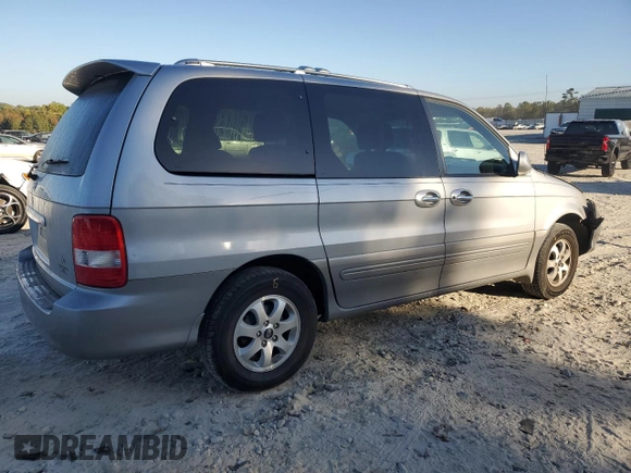 2004 Kia Sedona LX with VIN KNDUP131346508490, listed as a Copart auction lot 77391594 with 41,211 mi miles and Salvage Title. Bid and sale history available at carsss.com. Image 3.