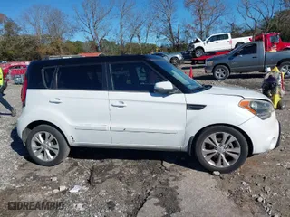 2012 Kia Soul + with VIN KNDJT2A64C7470988, listed as a IAAI auction lot 41082059 with 124,592 mi miles. Bid and sale history available at carsss.com. Image 13.