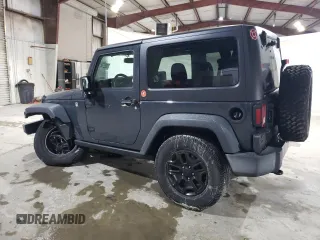2016 Jeep Wrangler Sport with VIN 1C4AJWAG1GL325667, listed as a Copart auction lot 82274744 with 85,975 mi miles and Salvage Title. Bid and sale history available at carsss.com. Image 2.