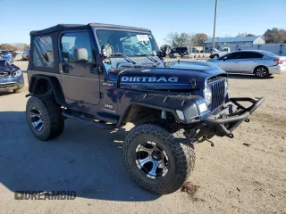2005 Jeep Wrangler Sport with VIN 1J4FA49S85P300851, listed as a Copart auction lot 42197705 with 126,322 mi miles and Salvage Title. Bid and sale history available at carsss.com. Image 4.
