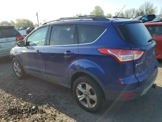 2014 Ford Escape SE z VIN 1FMCU9G95EUB88150, wystawiony jako Copart lot #52570095 z przebiegiem 143 129 mil mil oraz Szkoda całkowita • Salvage title. Historia ofert i sprzedaży dostępna na DreamBid. Obrazek 2.