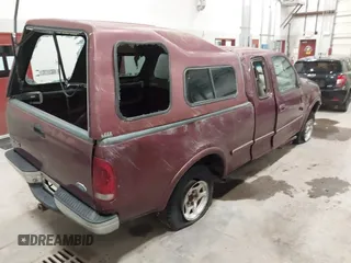 1997 Ford F-150 XL with VIN 1FTEX18L3VKC91921, listed as a IAAI auction lot 41820453 with 210,553 mi miles. Bid and sale history available at carsss.com. Image 14.