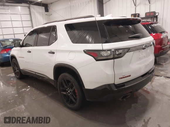 2018 Chevrolet Traverse Premier z VIN 1GNEVJKW4JJ163087, wystawiony jako IAAI lot #41509692 z przebiegiem 118 158 mil mil oraz . Historia ofert i sprzedaży dostępna na DreamBid. Obrazek 3.