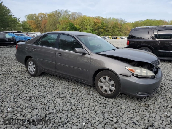 2003 Toyota Camry LE with VIN 4T1BE32K23U765973, listed as a Copart auction lot 54613145 with 226,030 mi miles and Salvage Title. Bid and sale history available at DreamBid. Image 4.