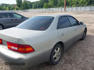 1998 Lexus ES 300 with VIN JT8BF28G9W5016146, listed as a IAAI auction lot 42672230 with 303,819 mi miles and . Bid and sale history available at DreamBid. Image 4.