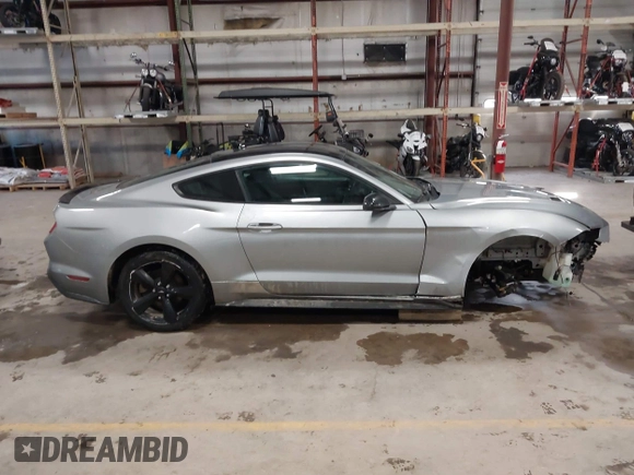 2021 Ford Mustang EcoBoost with VIN 1FA6P8TH1M5127800, listed as a IAAI auction lot 41625544 with 82,531 mi miles. Bid and sale history available at carsss.com. Image 14.