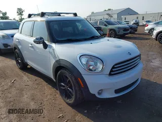 2012 MINI Countryman z VIN WMWZB3C59CWM30490, wystawiony jako IAAI lot #42479351 z przebiegiem 133 109 mil mil oraz . Historia ofert i sprzedaży dostępna na DreamBid. Obrazek 1.