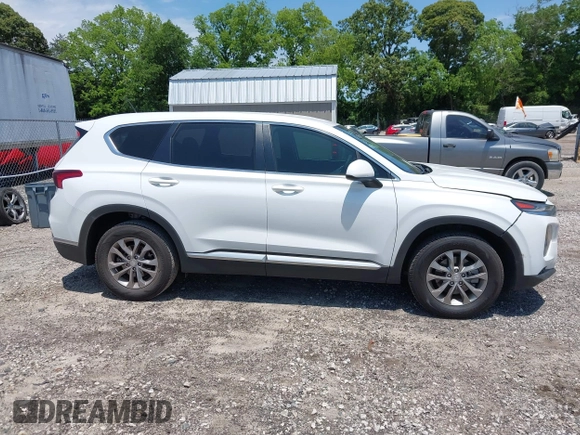 2019 Hyundai Santa Fe SE with VIN 5NMS23AD0KH013811, listed as a IAAI auction lot 42337926 with 87,000 mi miles and . Bid and sale history available at DreamBid. Image 13.