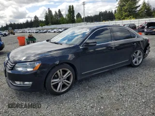 2014 Volkswagen Passat SEL Premium with VIN 1VWCN7A30EC021241, listed as a Copart auction lot 57815185 with 92,606 mi miles and Salvage title. Bid and sale history available at DreamBid. Image 1.