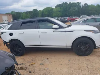 2020 Land Rover Range Rover Velar S z VIN SALYB2EX3LA292863, wystawiony jako IAAI lot #42077381 z przebiegiem 41 595 mil mil oraz . Historia ofert i sprzedaży dostępna na DreamBid. Obrazek 12.