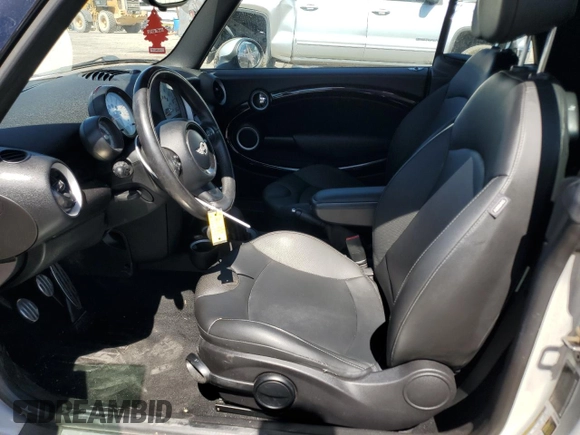 2011 MINI Convertible S with VIN WMWZP3C55BTX84489, listed as a Copart auction lot 57680375 with 86,313 mi miles and Clean title. Bid and sale history available at DreamBid. Image 7.