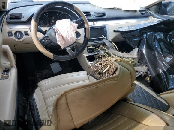 2010 Volkswagen CC Luxury with VIN WVWHL7AN3AE520131, listed as a Copart auction lot 55676515 with 111,128 mi miles and Salvage title. Bid and sale history available at DreamBid. Image 8.