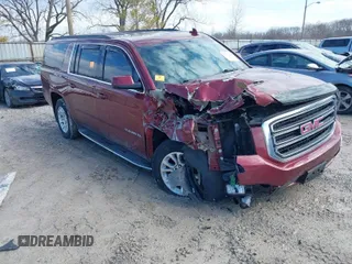 2019 GMC Yukon XL SLT with VIN 1GKS2GKC9KR341807, listed as a IAAI auction lot 41658848 with 68,204 mi miles and . Bid and sale history available at carsss.com. Image 1.