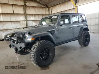 2022 Jeep Wrangler Unlimited High Tide with VIN 1C4HJXDG2NW221829, listed as a Copart auction lot 64836074 with 3,394 mi miles and Salvage Title. Bid and sale history available at DreamBid. Image 1.