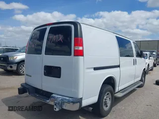 2018 Chevrolet Express Cargo Van with VIN 1GCWGAFG8J1906084, listed as a IAAI auction lot 41814922 with 162,977 mi miles. Bid and sale history available at carsss.com. Image 4.
