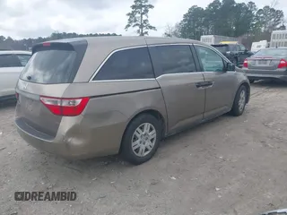 2012 Honda Odyssey LX z VIN 5FNRL5H25CB019912, wystawiony jako IAAI lot #41458224 z przebiegiem 158 980 mil mil oraz . Historia ofert i sprzedaży dostępna na DreamBid. Obrazek 4.