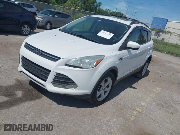2013 Ford Escape SE with VIN 1FMCU0GX5DUA85464, listed as a IAAI auction lot 42701315 with 158,093 mi miles and . Bid and sale history available at DreamBid. Image 2.